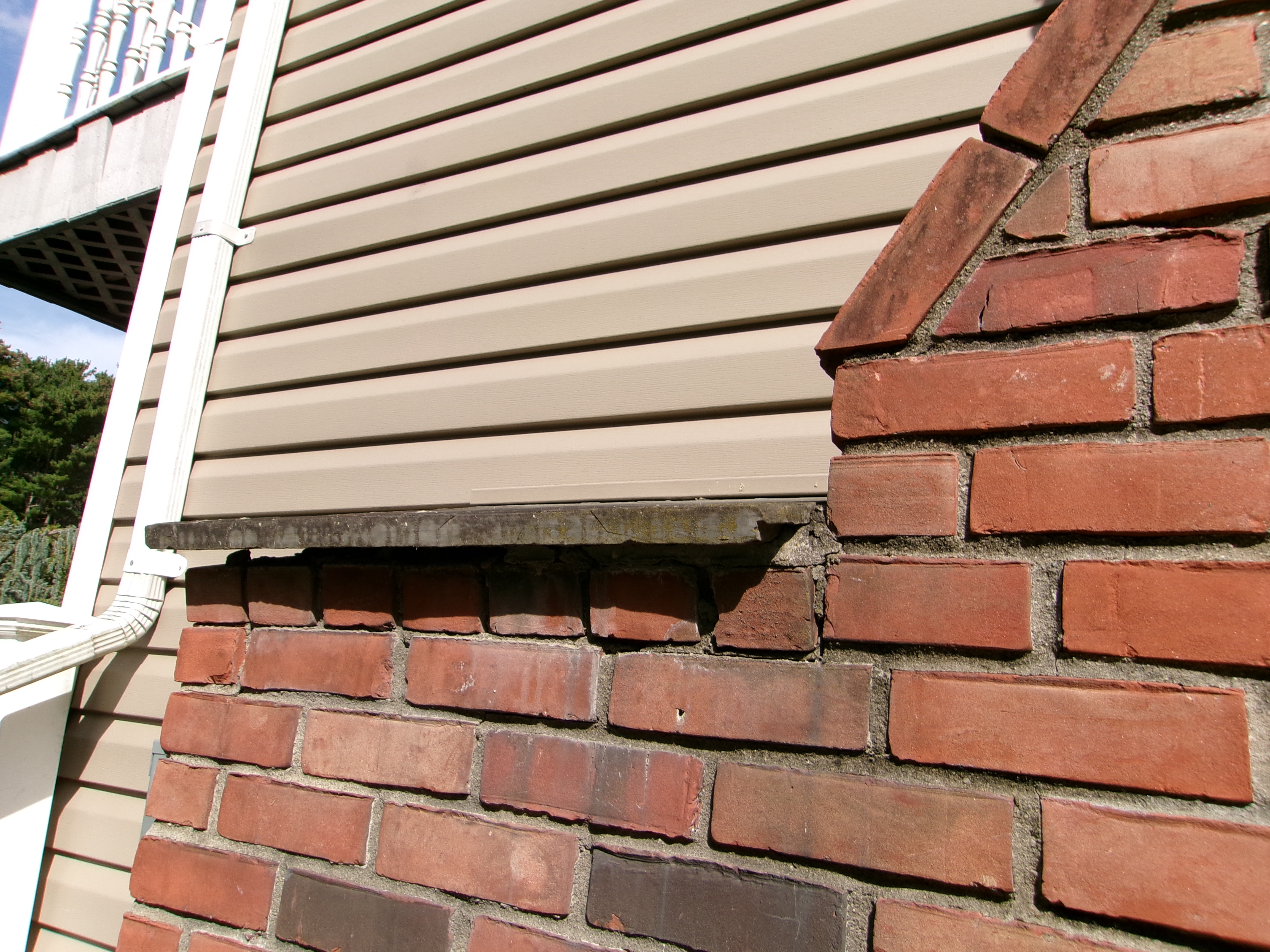 Exterior brick and siding inspection – masonry condition and water intrusion check